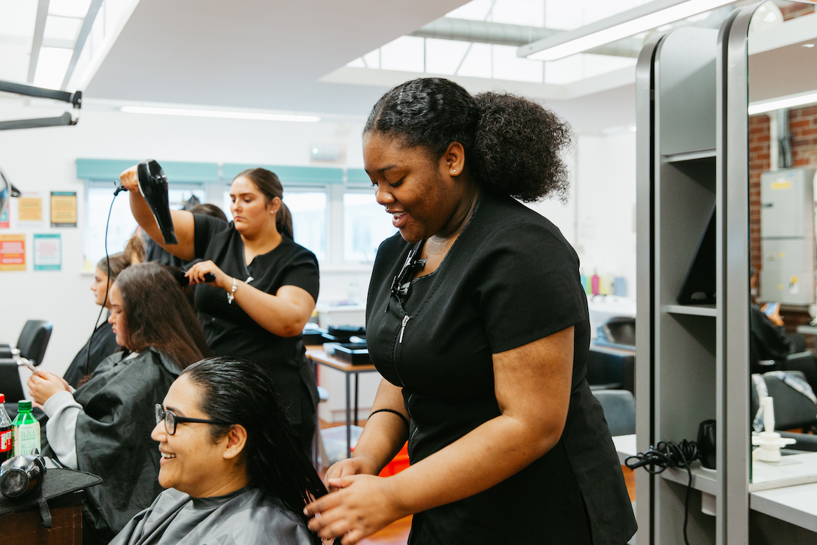 Woman styling hair